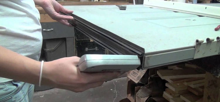 damaged steel door repair Reedley